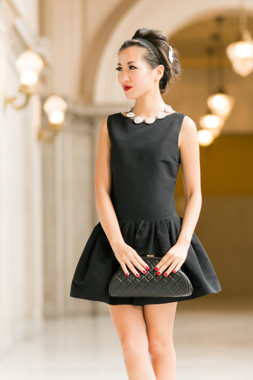 black dress with pearl collar