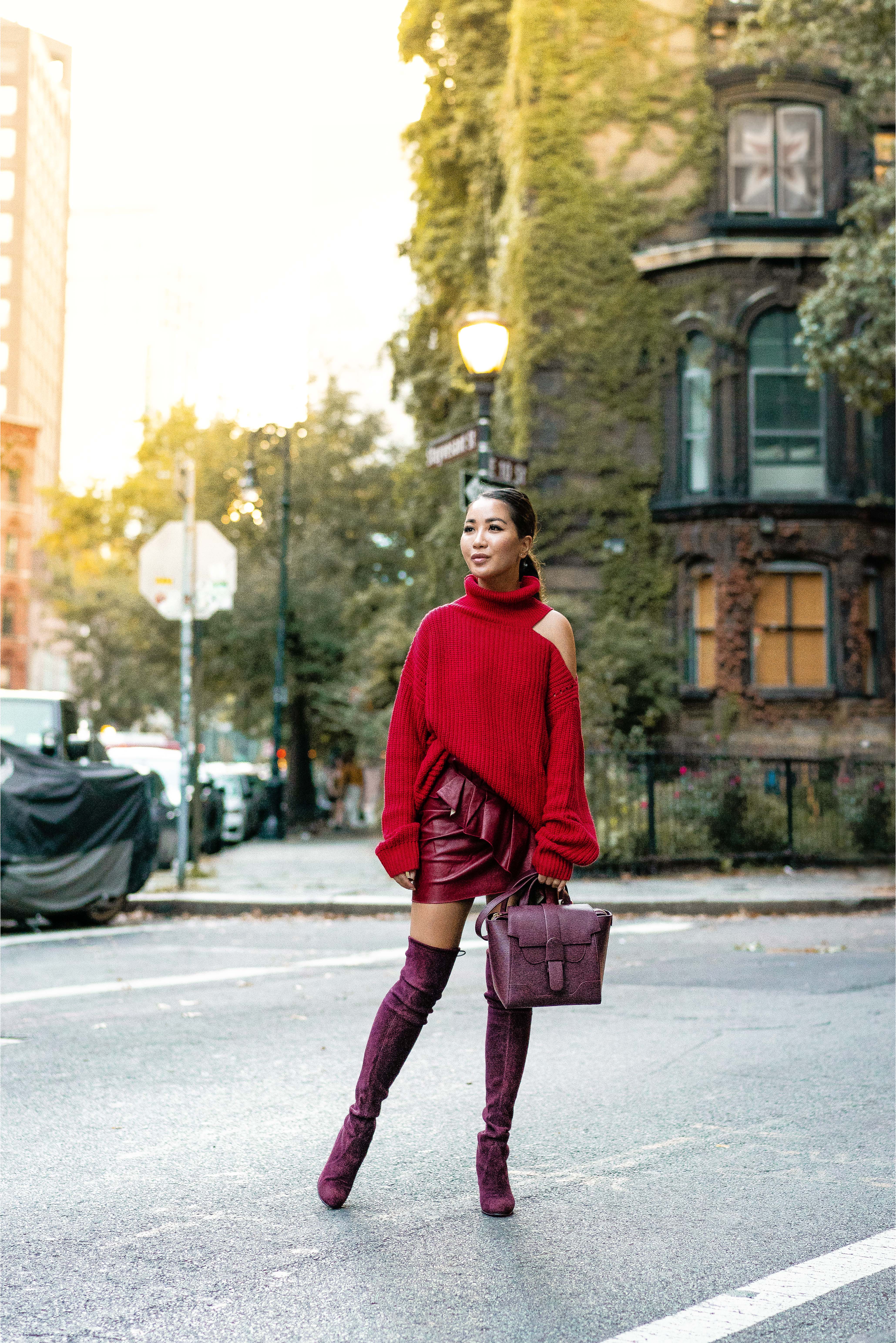 Fall outfits in red sweater red skirt red Stuart Weitzman boots and Senreve bag